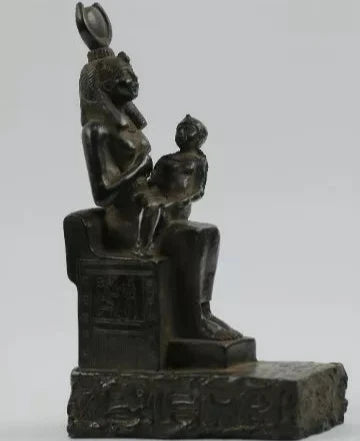 Isis goddess of healing and motherhood breastfeeding her son Horus