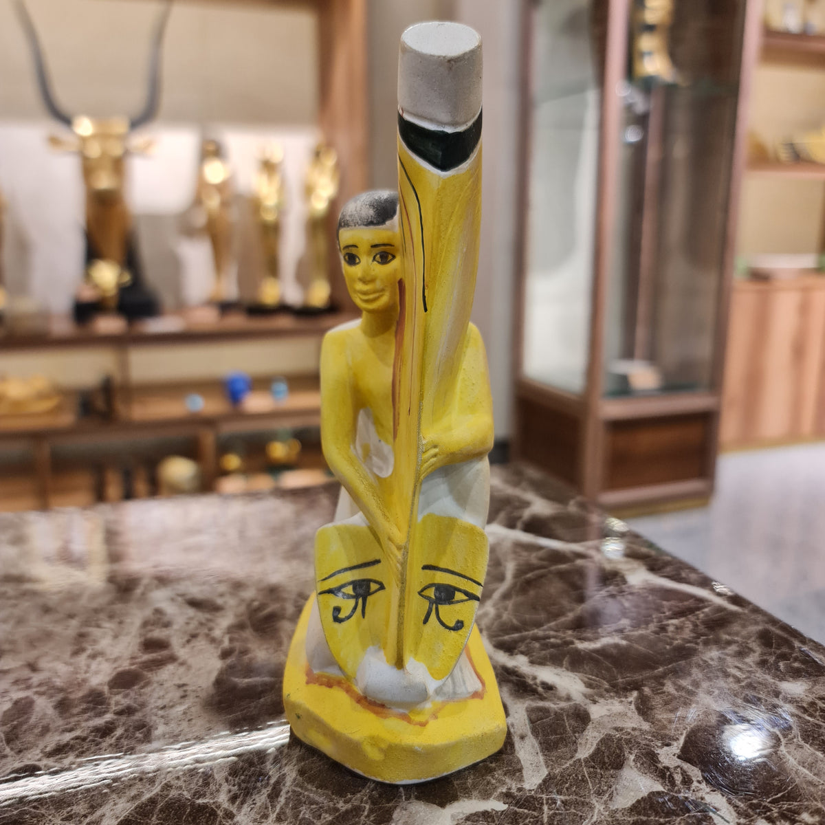 Back view of the ancient Egyptian museum reproduction statue