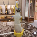 Ancient Egyptian statue museum reproduction shown from the side