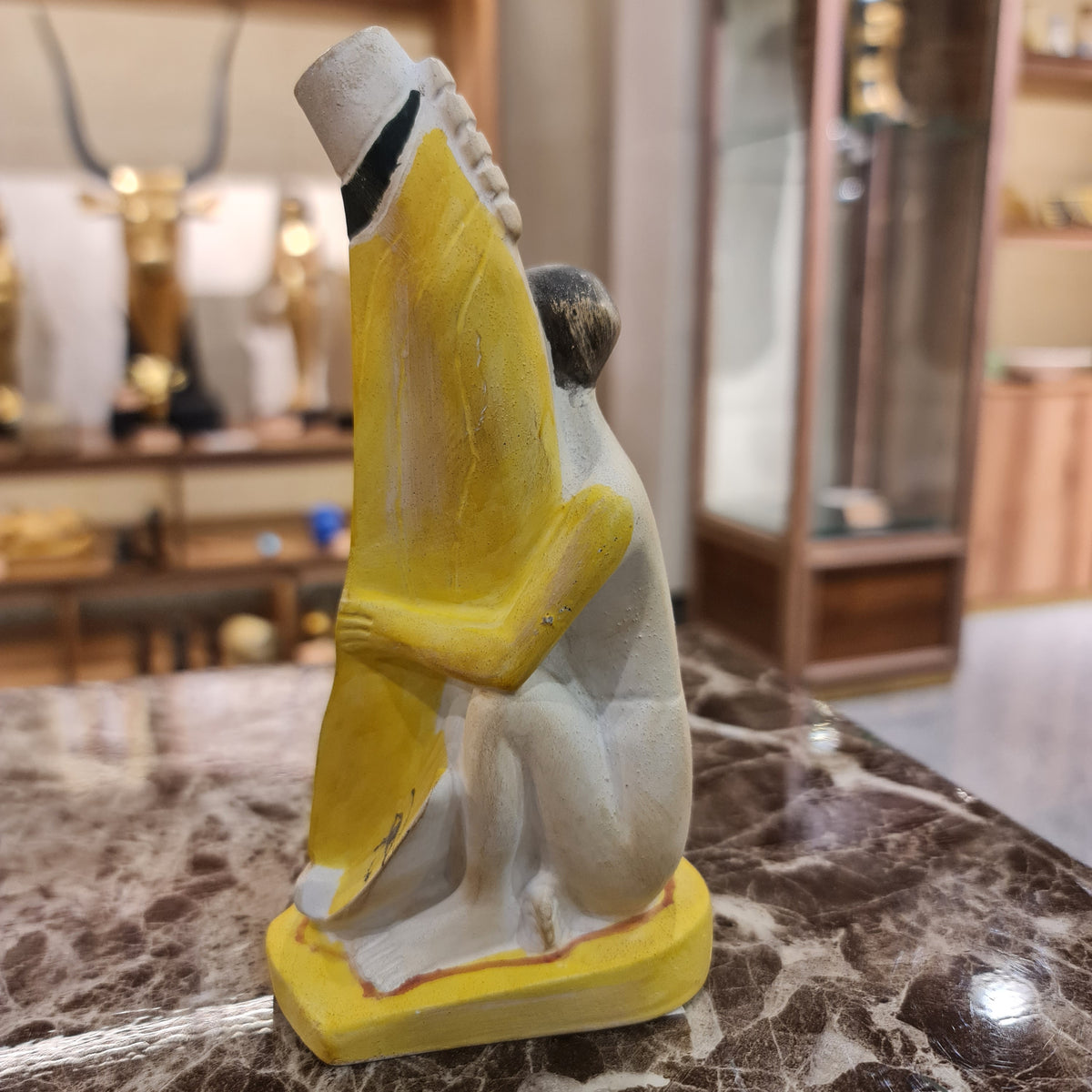 Ancient Egyptian stone statue museum reproduction with size reference