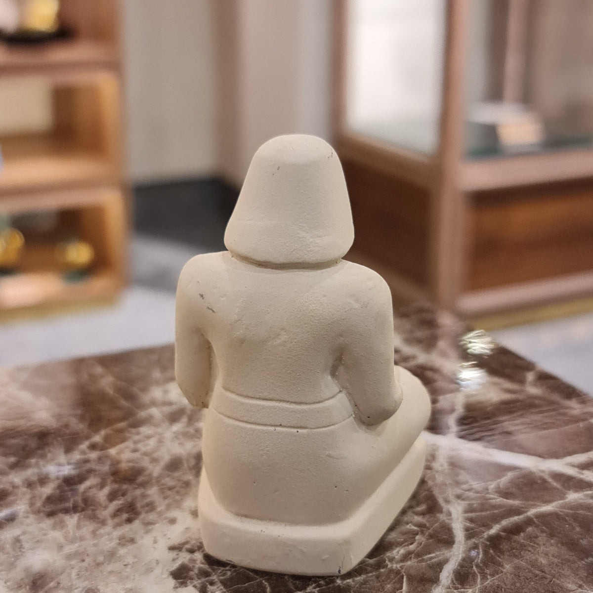 Ancient Egyptian seated scribe statue museum reproduction, Style 2, three-quarter view