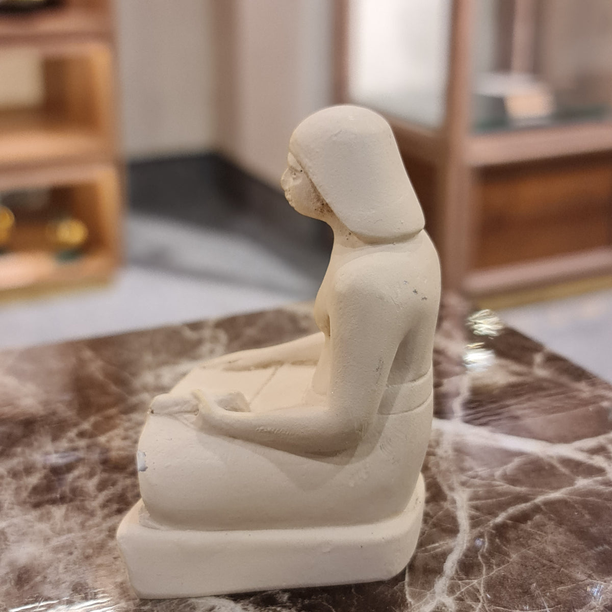 Small seated scribe statue museum reproduction, Style 2, shown for scale