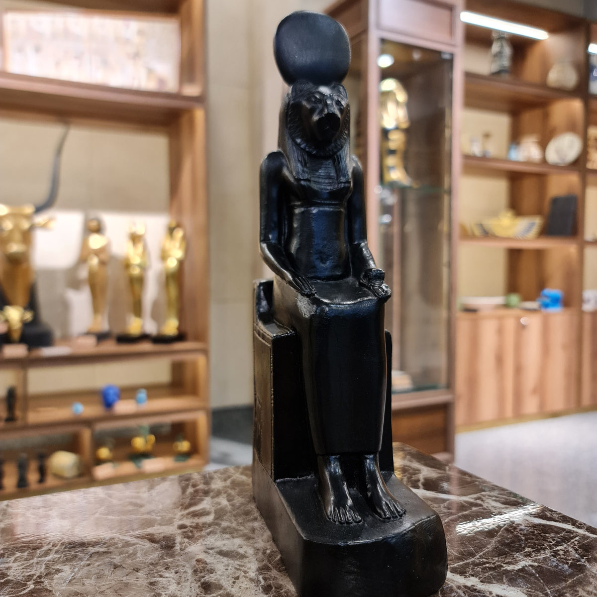 Black Sekhmet lioness goddess statue museum reproduction, front view