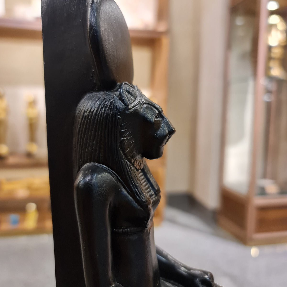 Sekhmet statue museum reproduction, close-up of the ankh held in the left hand