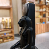 Sekhmet statue museum reproduction, close-up of the lioness head and solar disk crown