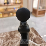 Horus falcon statue displayed on a shelf
