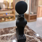Black Horus falcon statue with sun crown, museum reproduction, front view