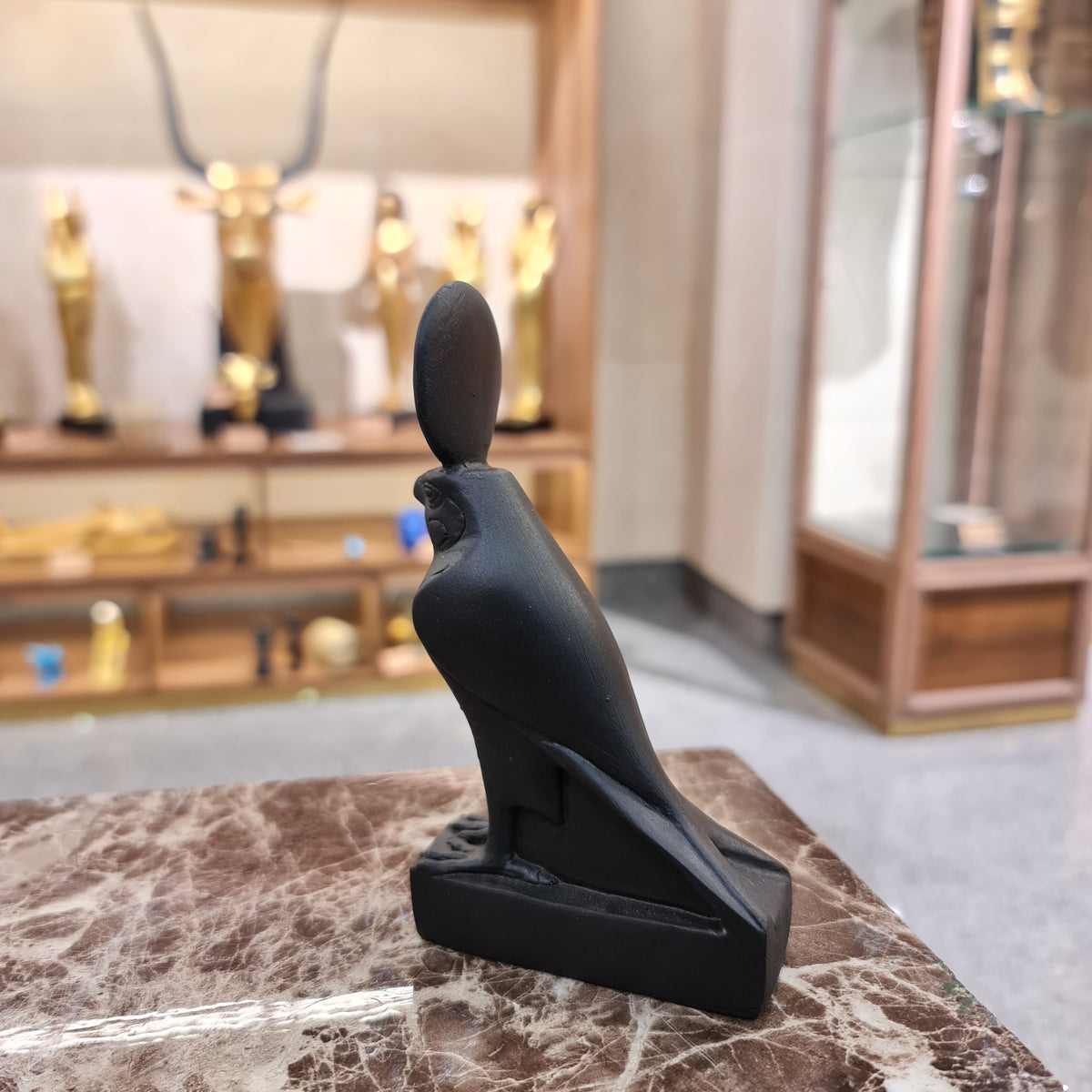 Full view of the black Horus falcon statue museum reproduction