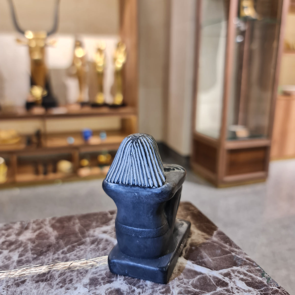 Top view of black cube block statue, museum reproduction