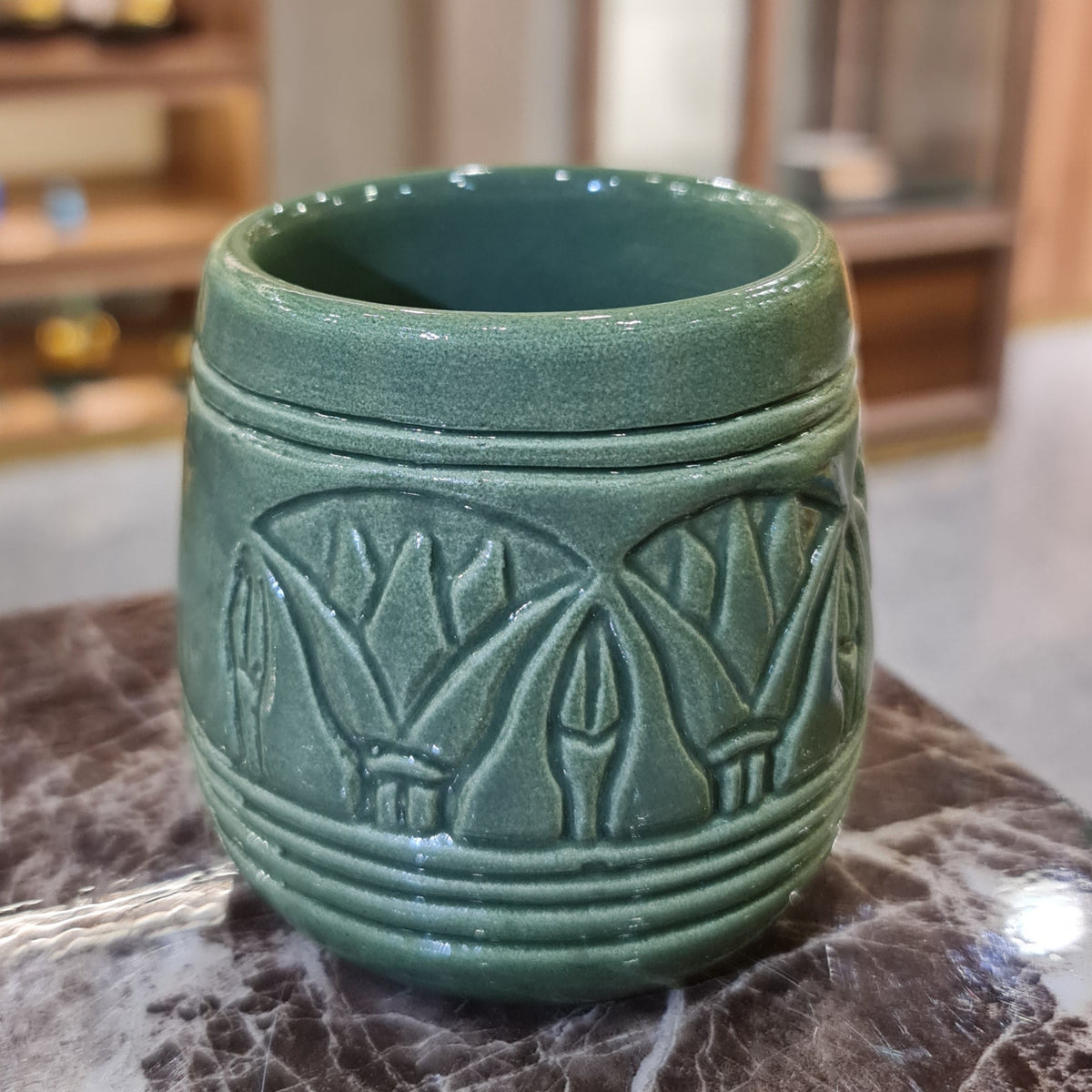 Handmade porcelain Egyptian mug with lotus flower motif