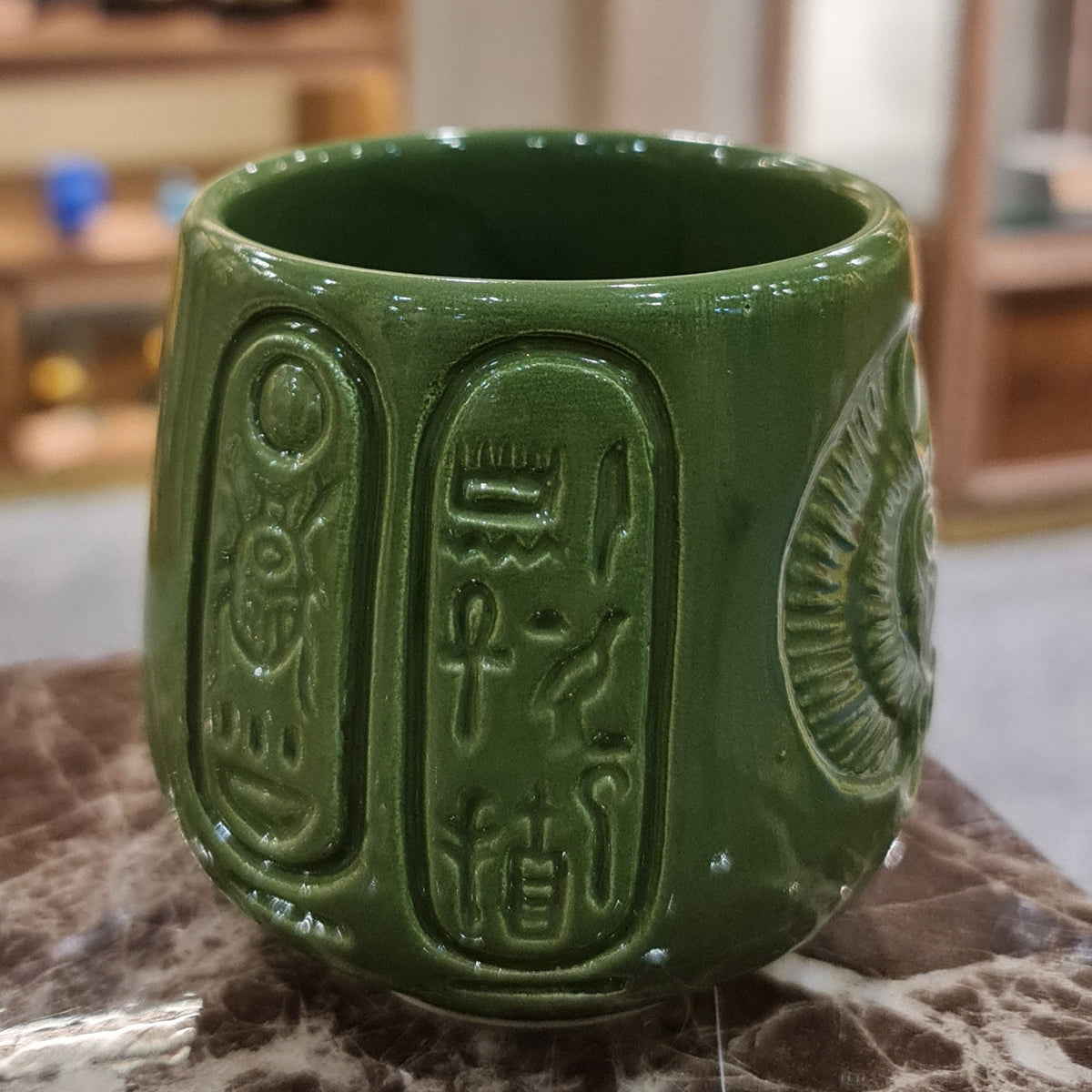 Handmade porcelain Egyptian mug with scarab beetle design