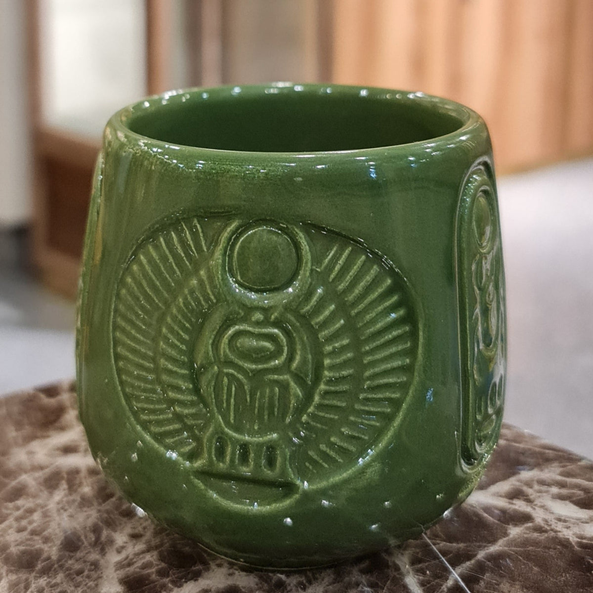 Handmade porcelain Egyptian mug with scarab beetle design