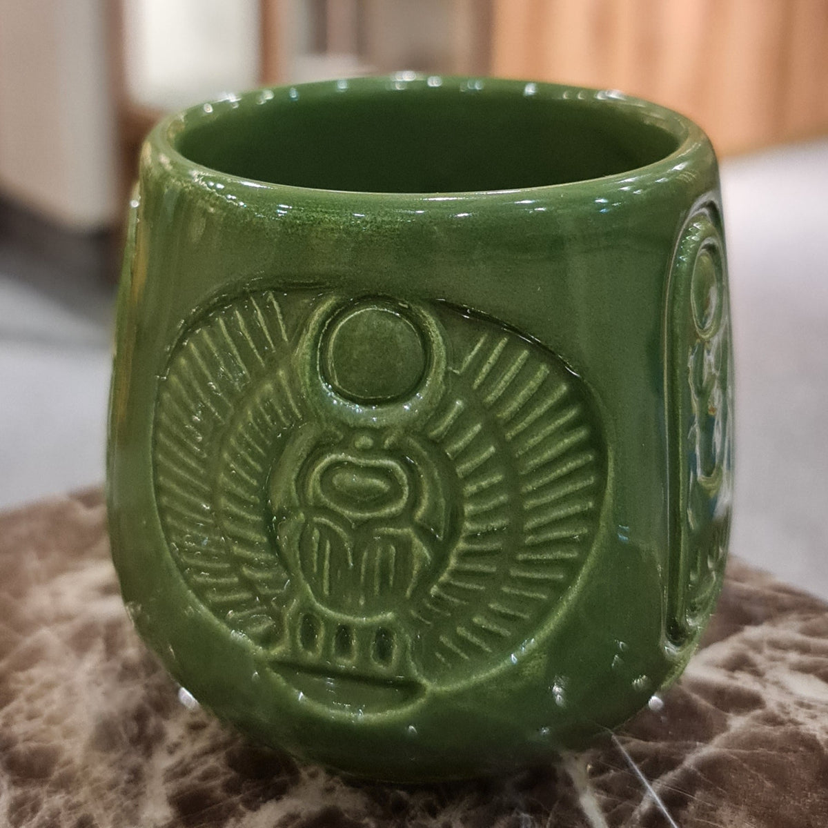 Handmade porcelain Egyptian mug with scarab beetle design