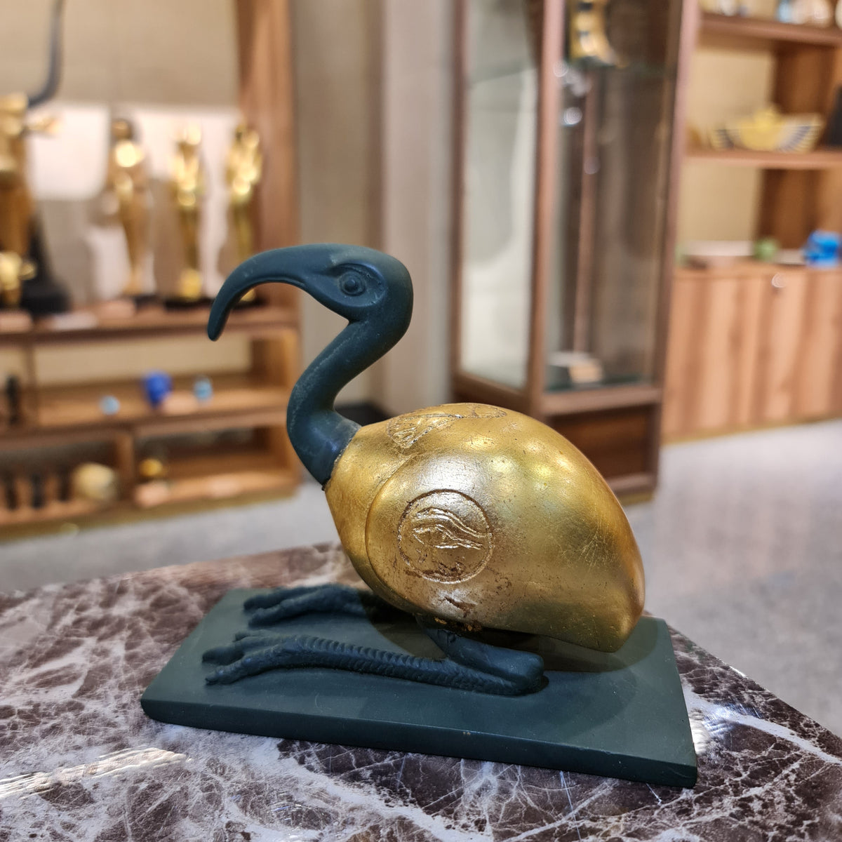 Thoth ibis-form statue museum reproduction, angled view