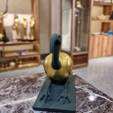 Thoth ibis-form statue museum reproduction shown next to a size reference