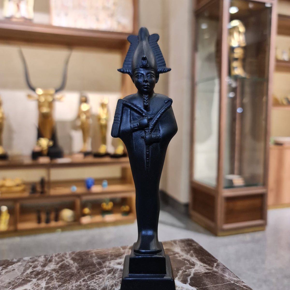 Close-up of the Atef crown on the Osiris museum reproduction statue