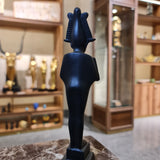 Osiris museum reproduction statue shown from the side
