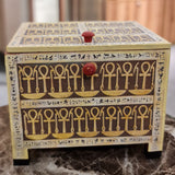 Tutankhamun-motif wooden keepsake box, front view, museum reproduction