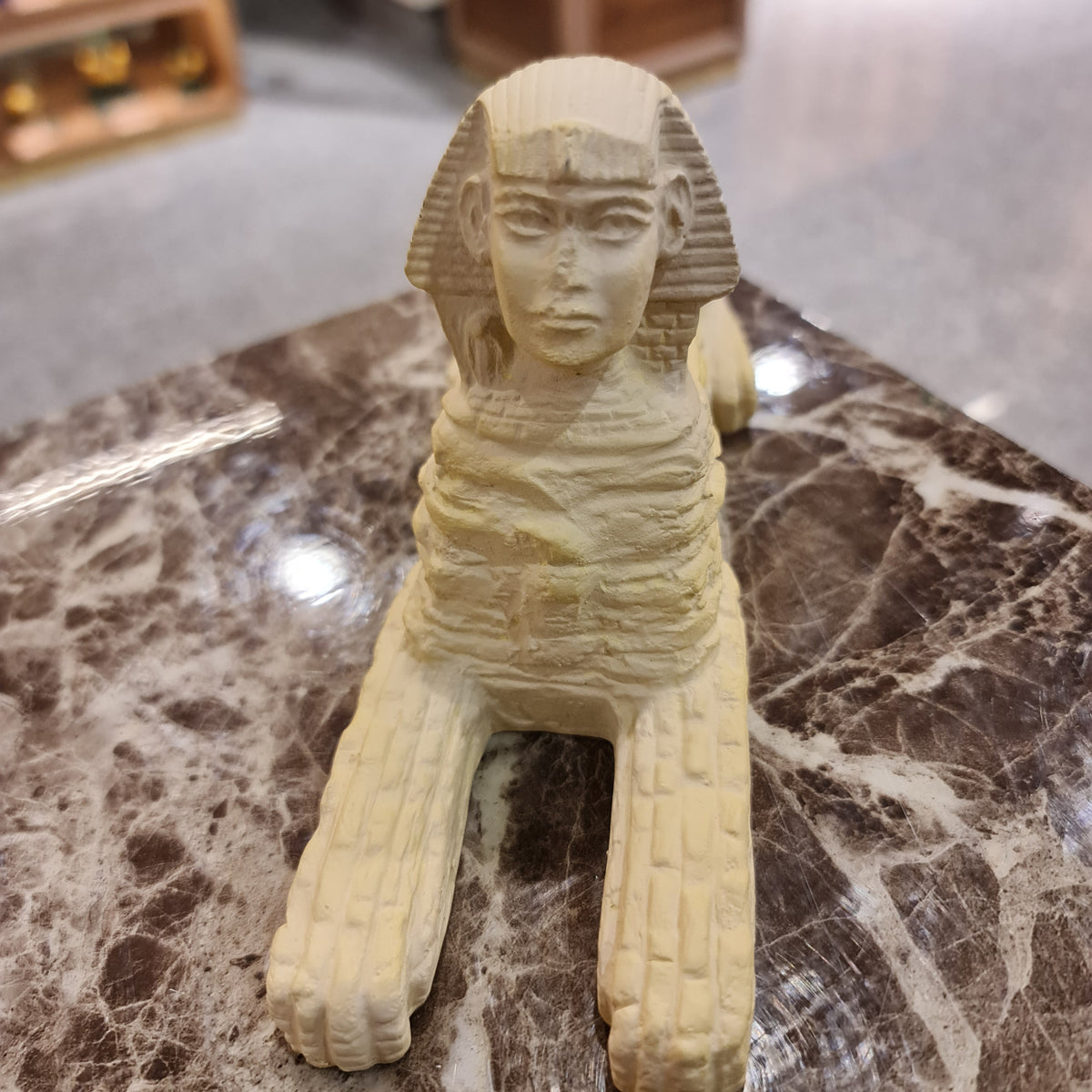Ancient Egyptian Sphinx statue museum reproduction, front view