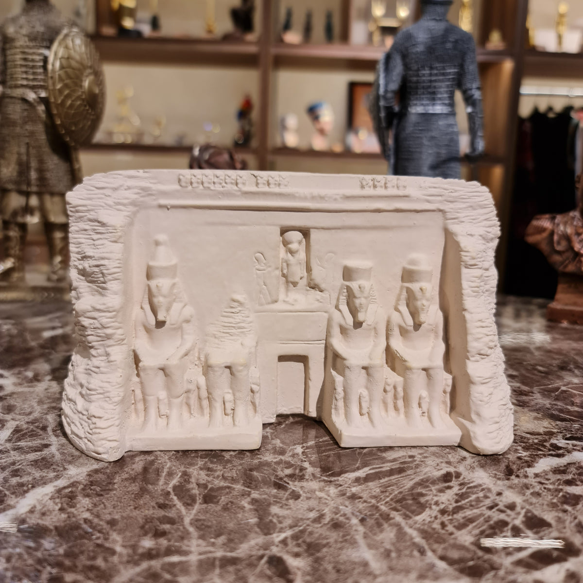 Close-up of the colossal seated Ramses II statues on the Abu Simbel façade model