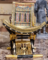 Full view of the ceremonial throne of King Tutankhamun, museum reproduction