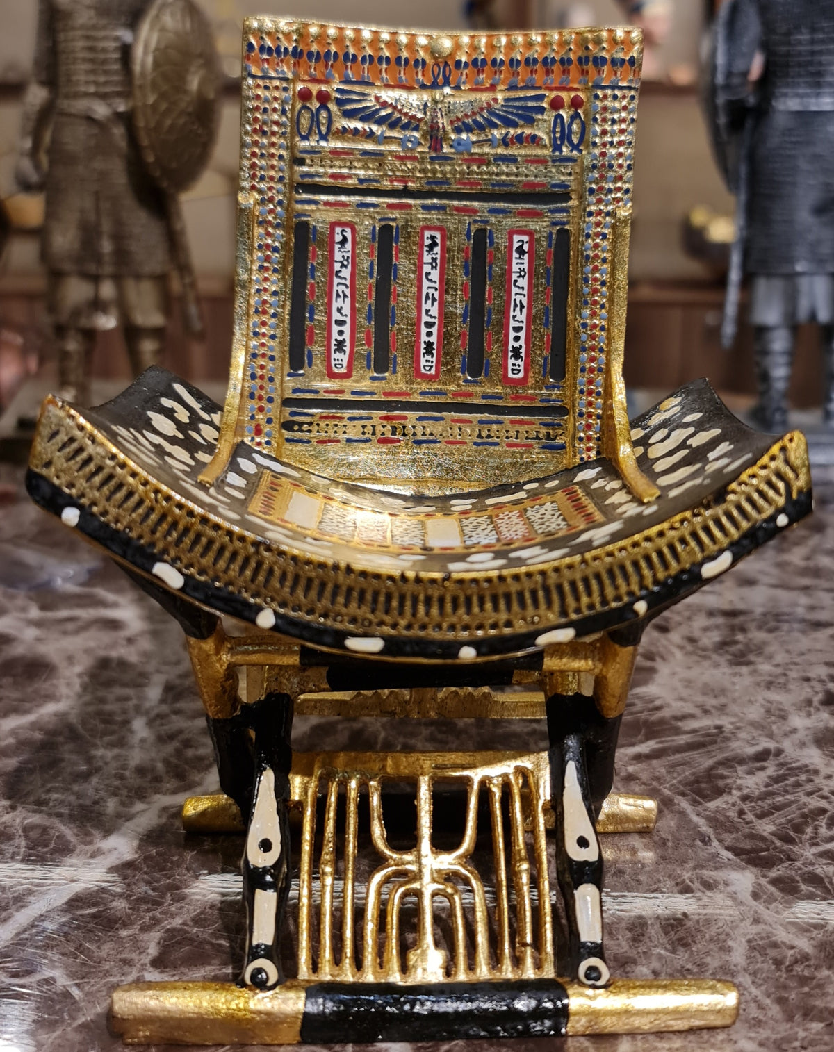 Ceremonial throne of King Tutankhamun museum reproduction, seat detail
