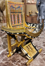 King Tutankhamun's ceremonial throne museum reproduction, side profile