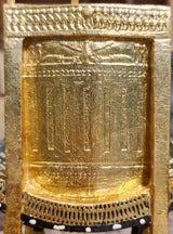 Ceremonial throne of King Tutankhamun museum reproduction, shown at an angle