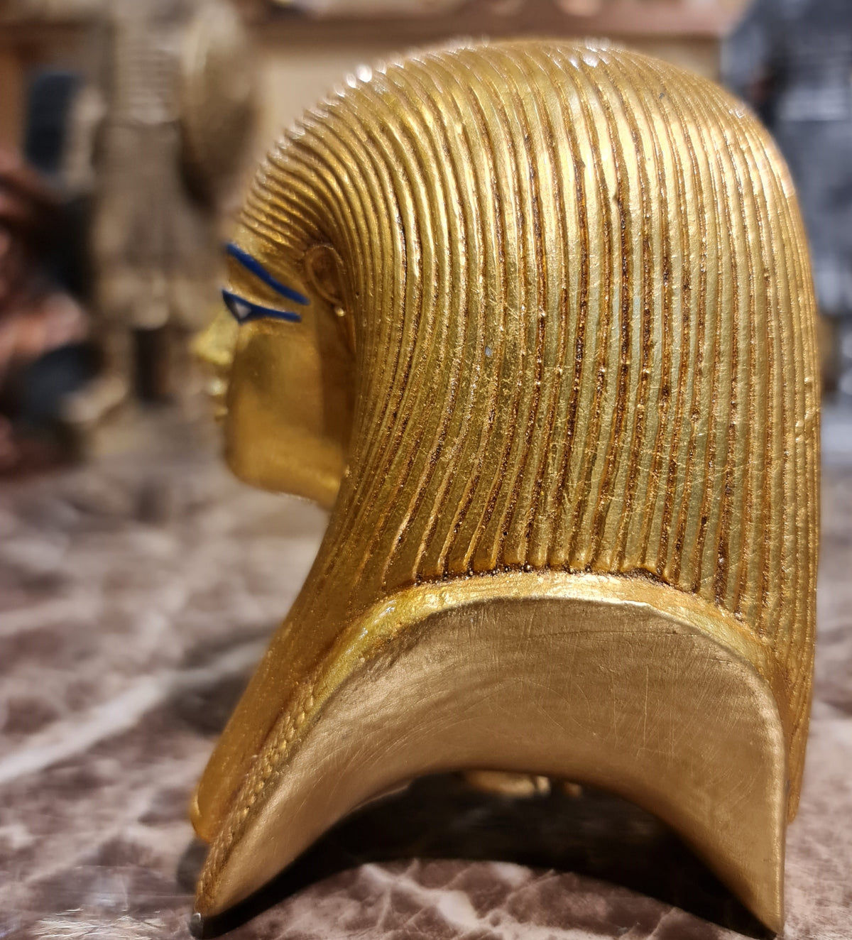 Yuya museum reproduction mask displayed on stand