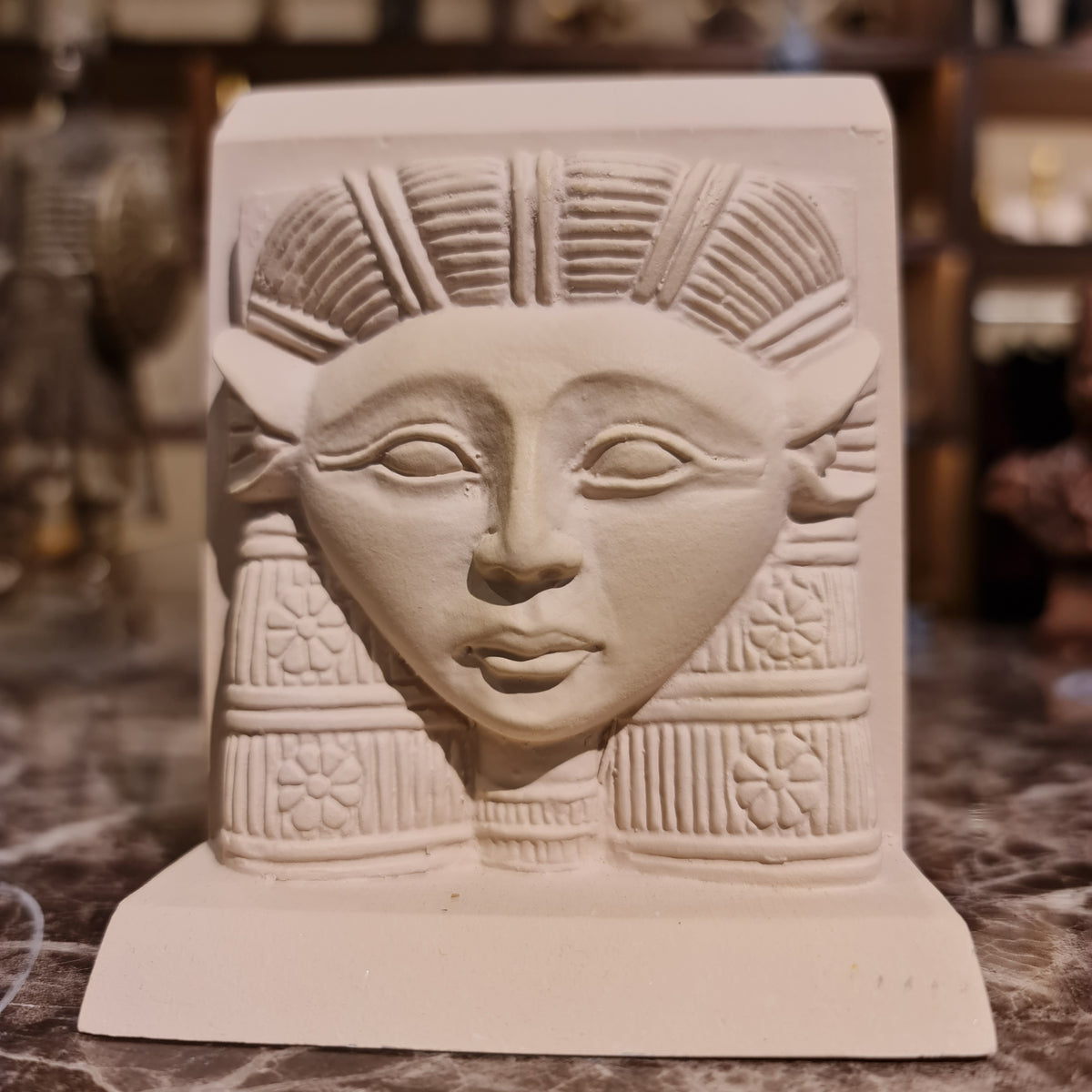 Hathor head sculpture museum reproduction shown at an angle
