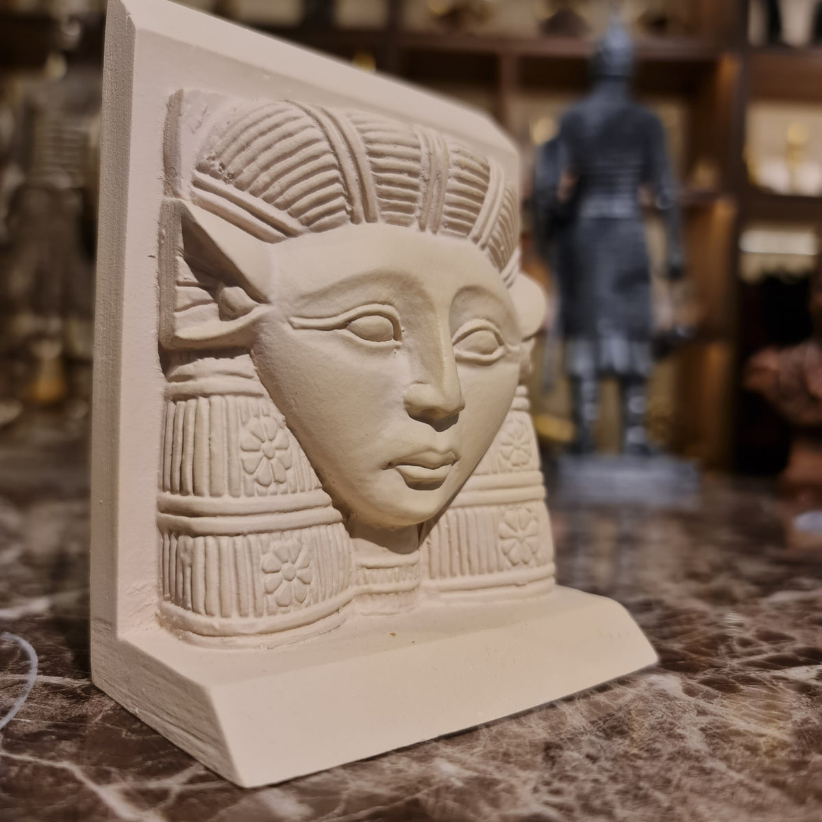 Close-up of the cow-ear detail on the Hathor head sculpture