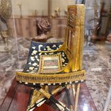 Ceremonial throne of King Tutankhamun museum reproduction, detail of gilded carving