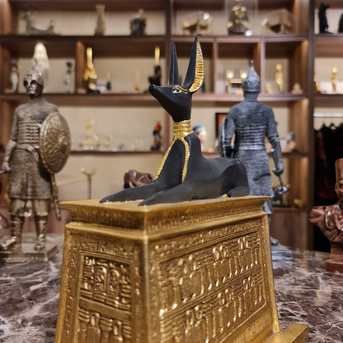 Back view of the Anubis portable shrine statue, museum reproduction