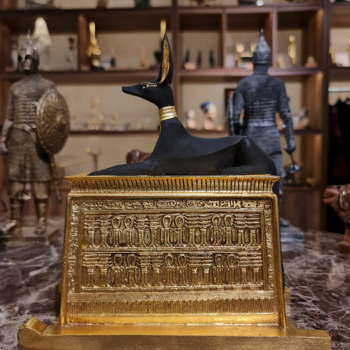 Side profile of the Anubis portable shrine statue, museum reproduction