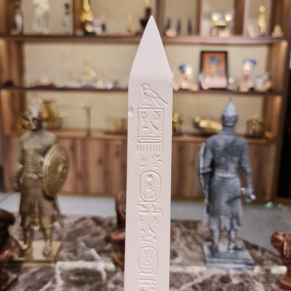 Egyptian obelisk museum reproduction, base and pyramidion detail view