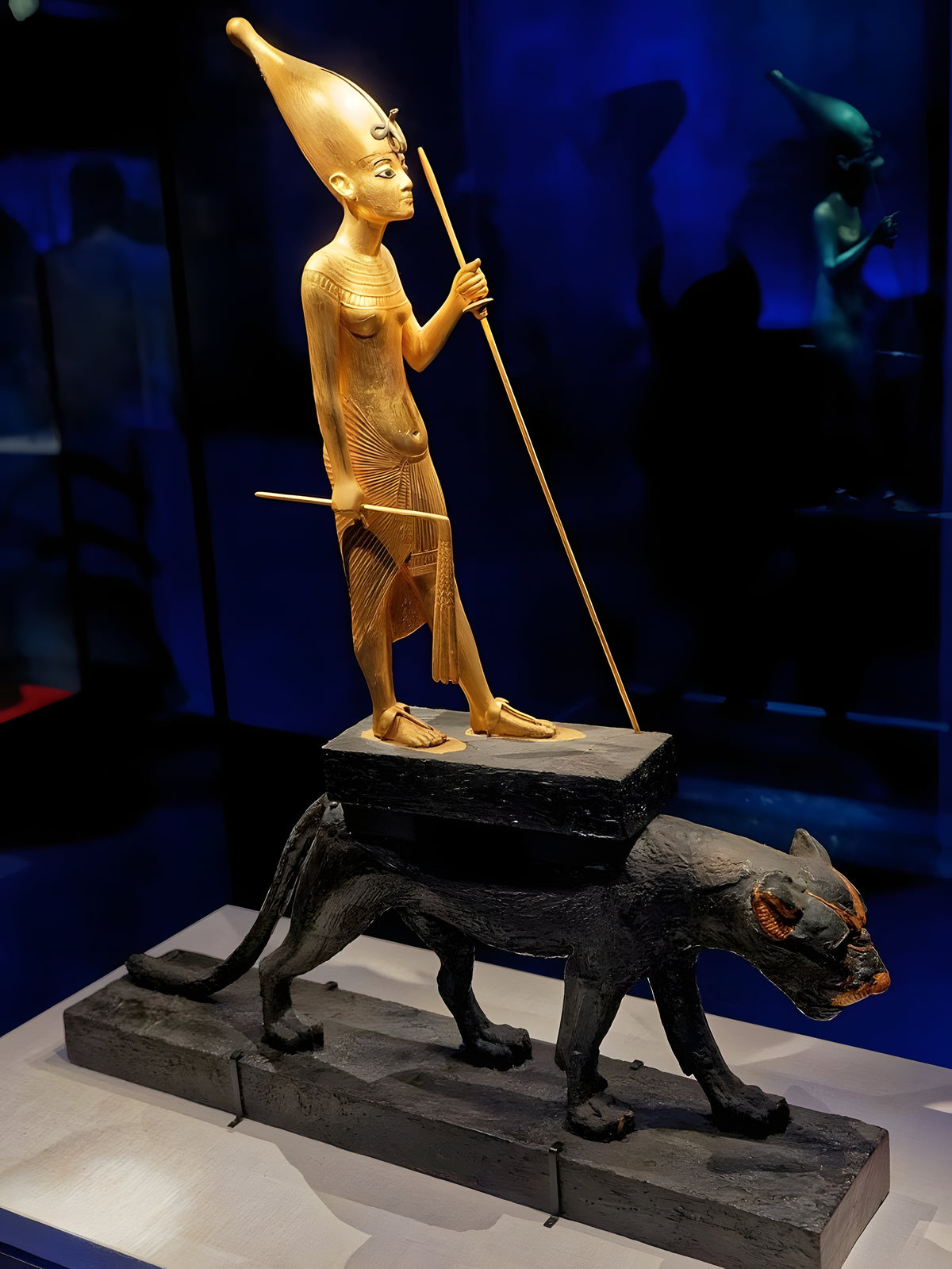 Angled view of Tutankhamun on leopard statue craftsmanship