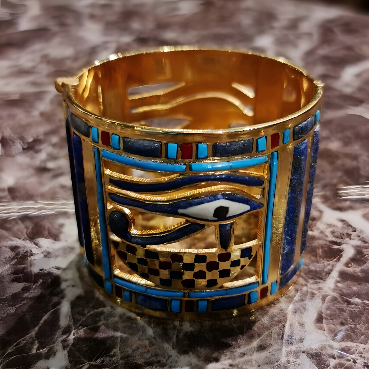 Side view of Shoshenq II bracelet showing precious stone inlays