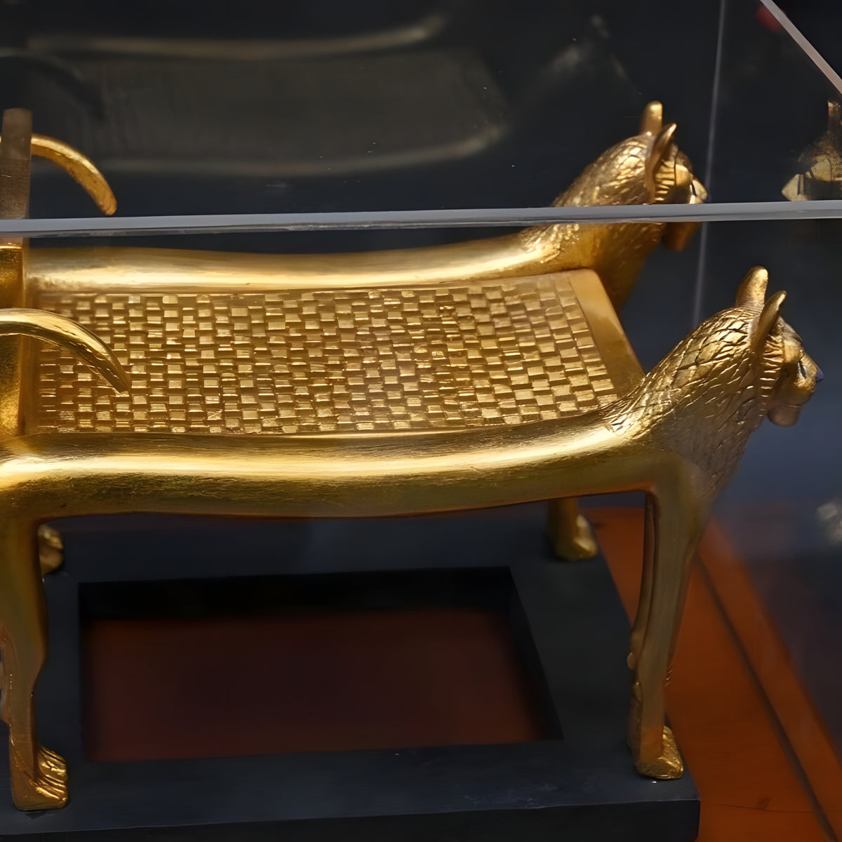 Angled view of Tutankhamun lioness bed craftsmanship