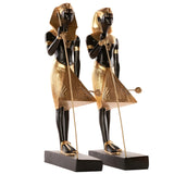 Black and gold Tutankhamun guardian statue pair, museum replica