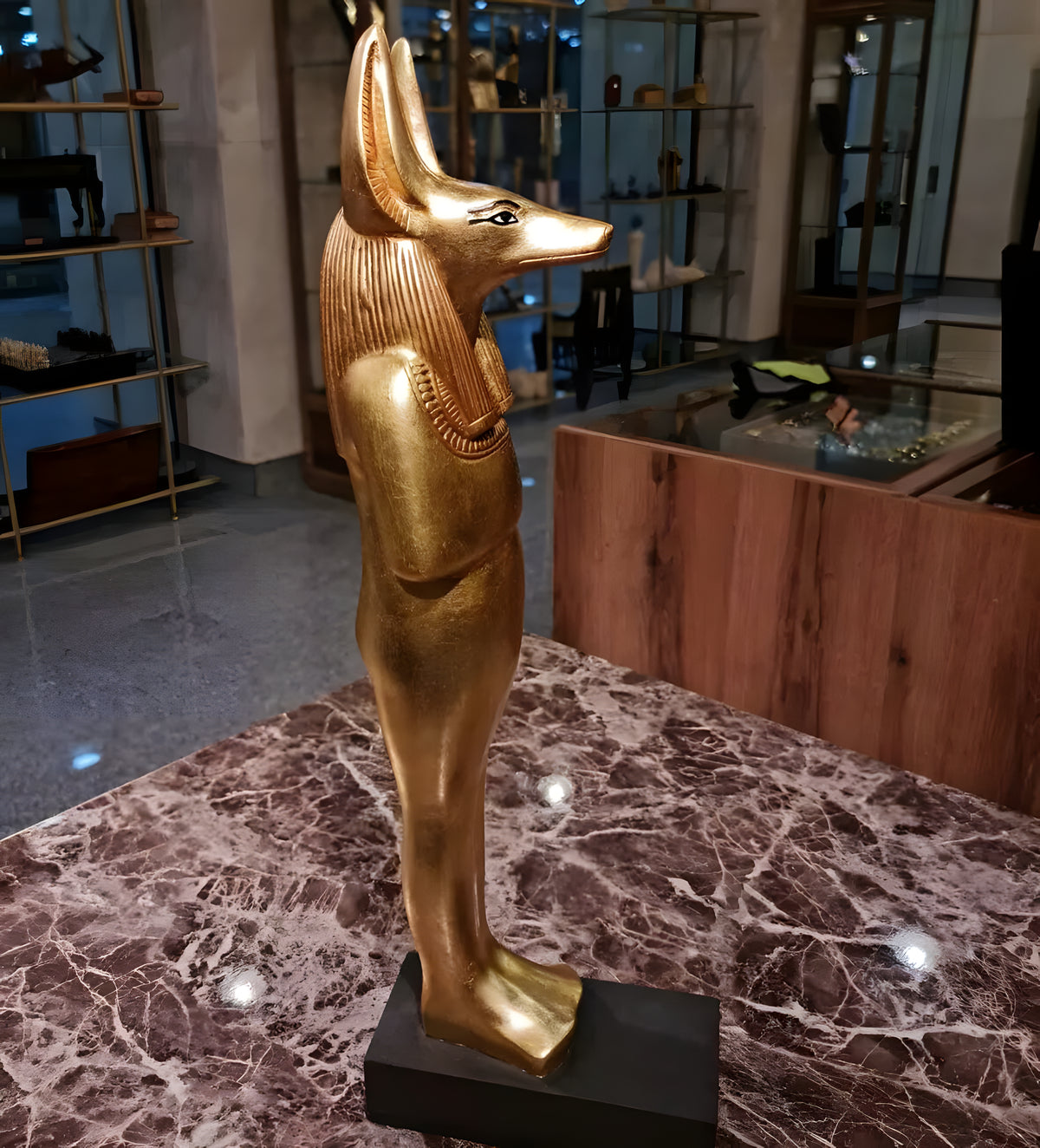 Angled view of Anubis statue craftsmanship