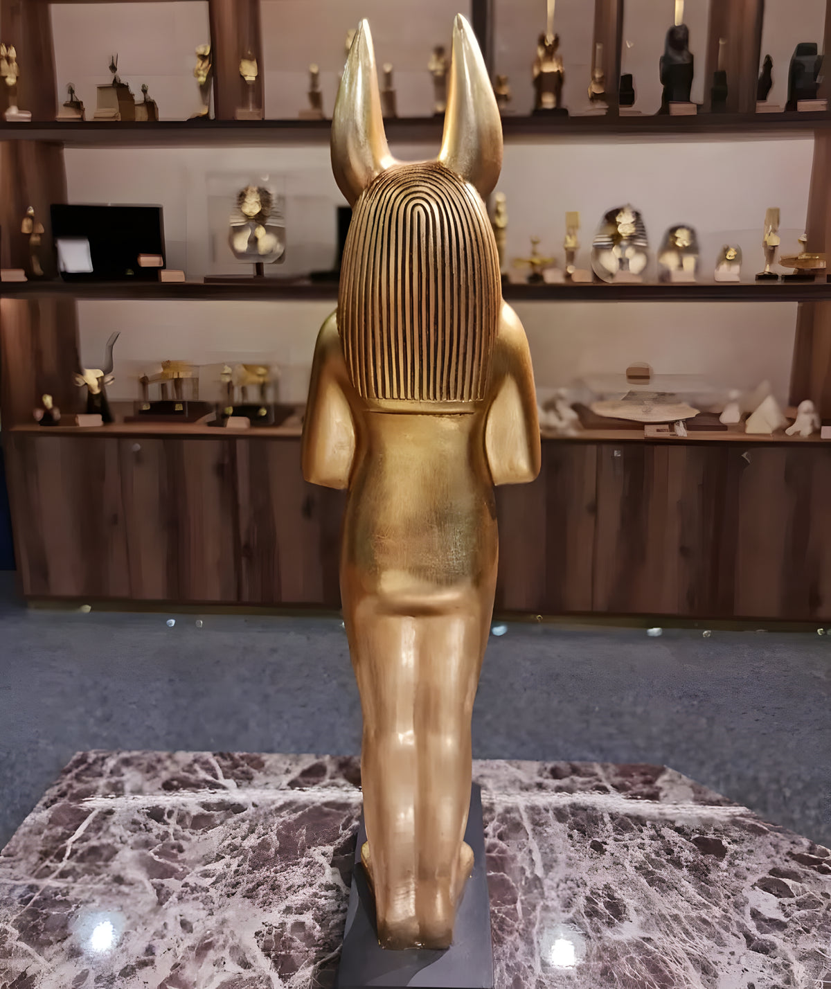 Front view of Anubis god statue museum reproduction