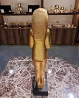 Side view of golden ushabti replica No. 3