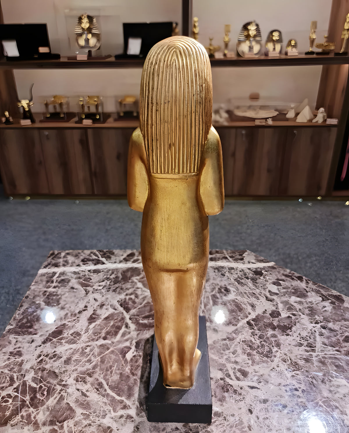 Side view of golden ushabti replica No. 3