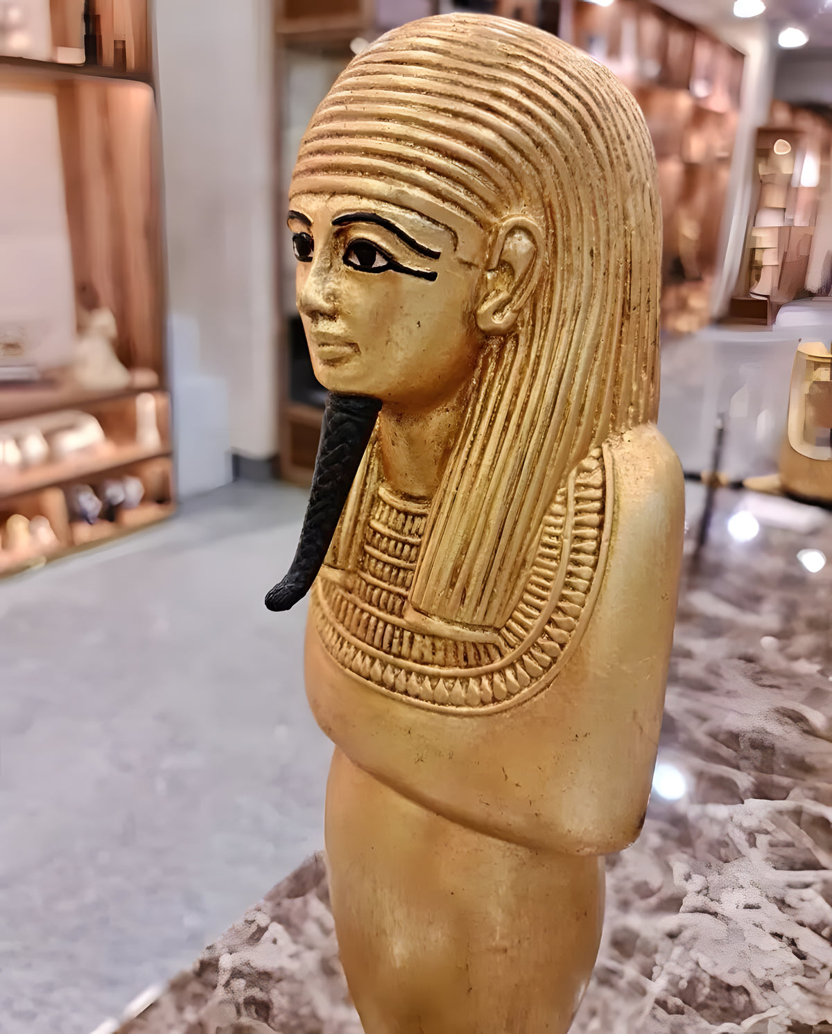 Ushabti replica No. 3 displayed on stand