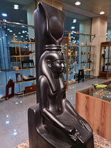 Close-up of Isis statue crown and headdress detail