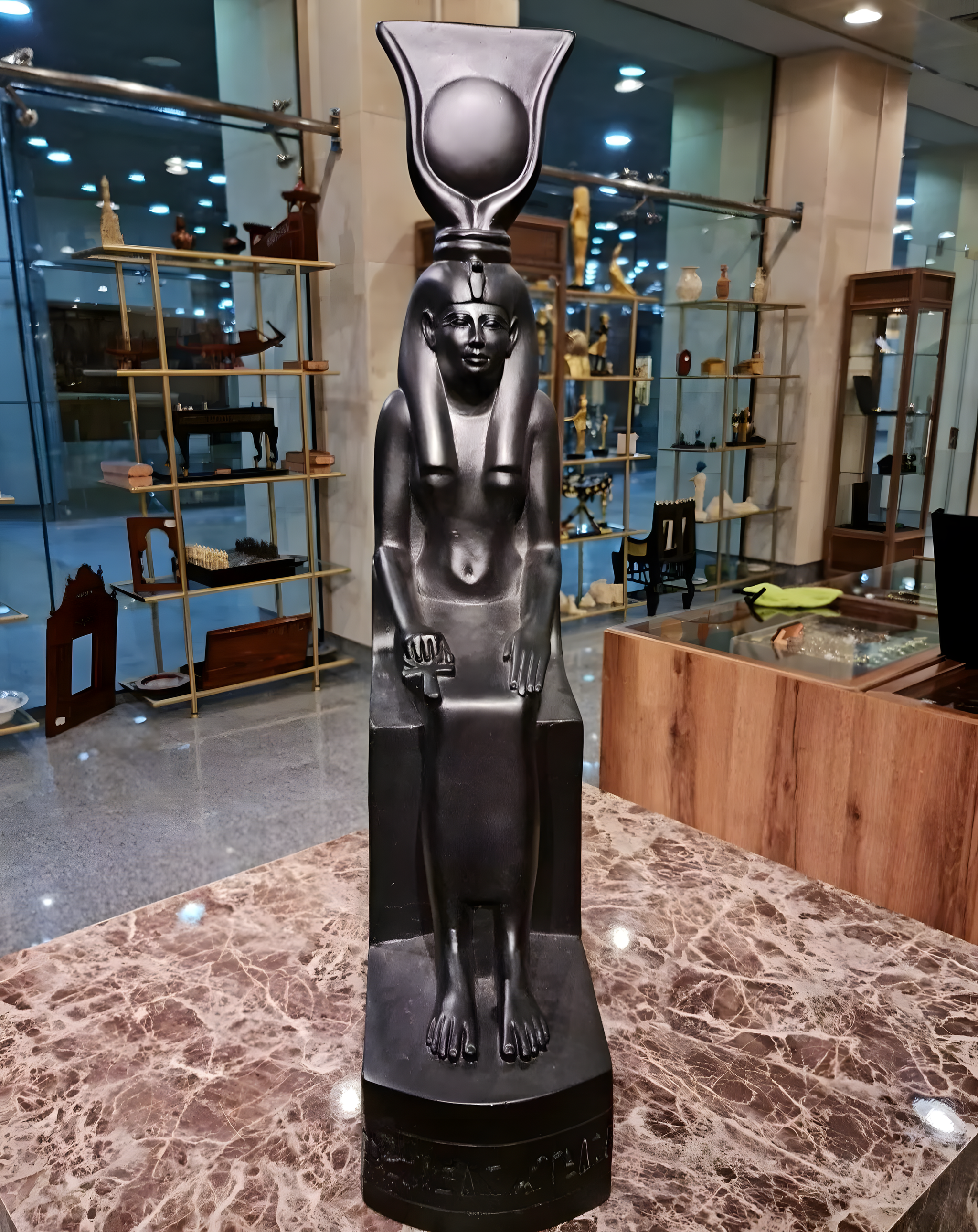 Side view of goddess Isis statue replica