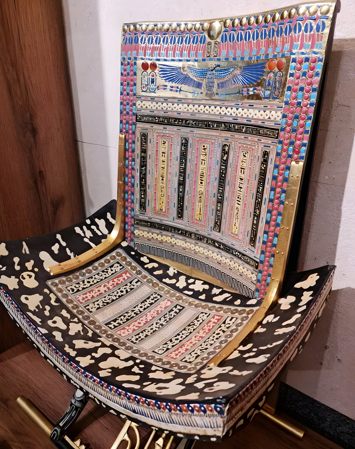 Detail of armrest carving on ceremonial throne