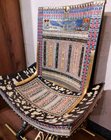 Detail of armrest carving on ceremonial throne