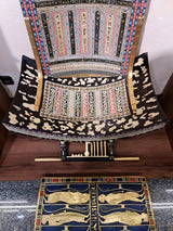 Angled view of ceremonial throne craftsmanship