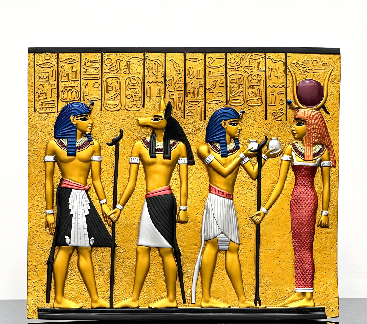 Close-up detail of the Anubis carving on the Egyptian museum reproduction wall relief